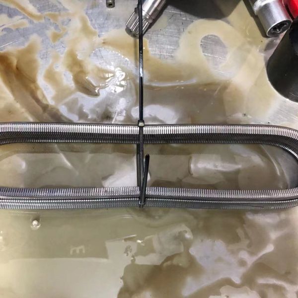 日产系列CVT变速箱进水后导致变速箱损坏，变速箱油变质发白，检修波箱